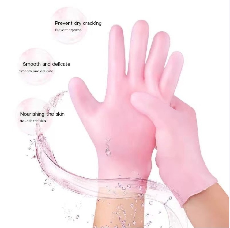 Hands wearing pink silicone moisturizing gloves