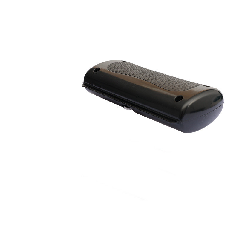 Black pet de-shedding comb, side view