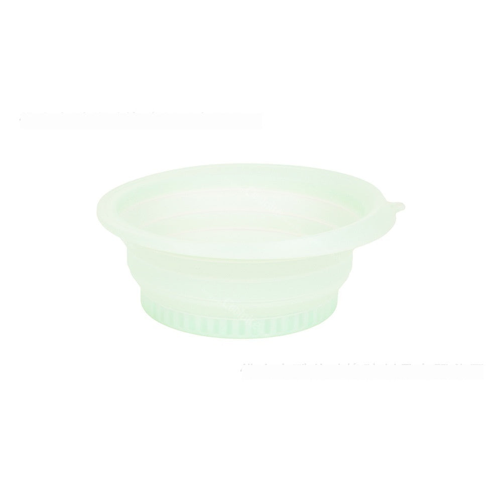 Mint green collapsible silicone ice basin, side view