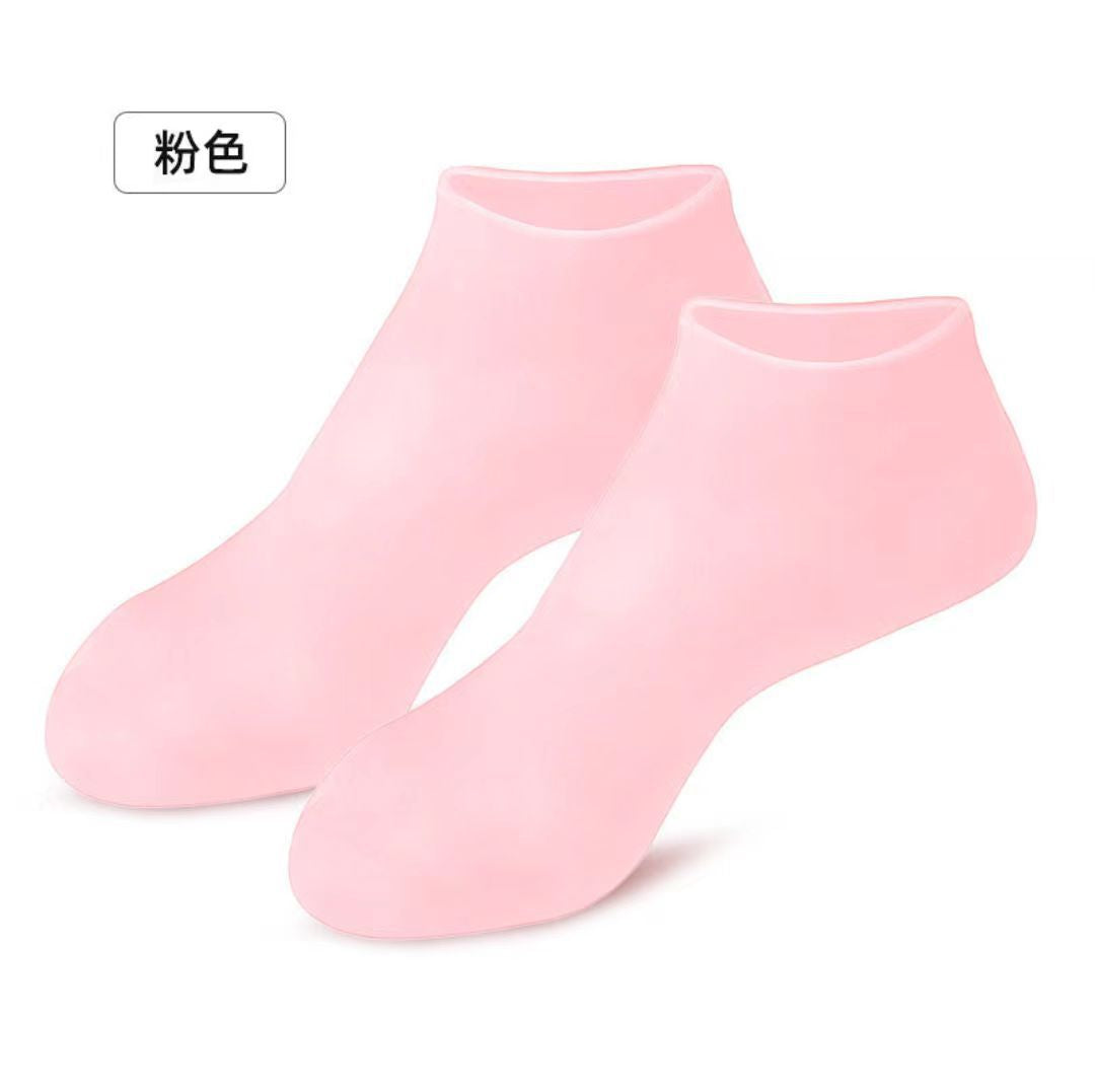 Pair of pink silicone moisturizing socks