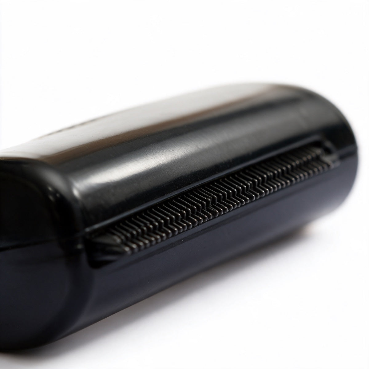 Close-up of the pet grooming comb's fine teeth