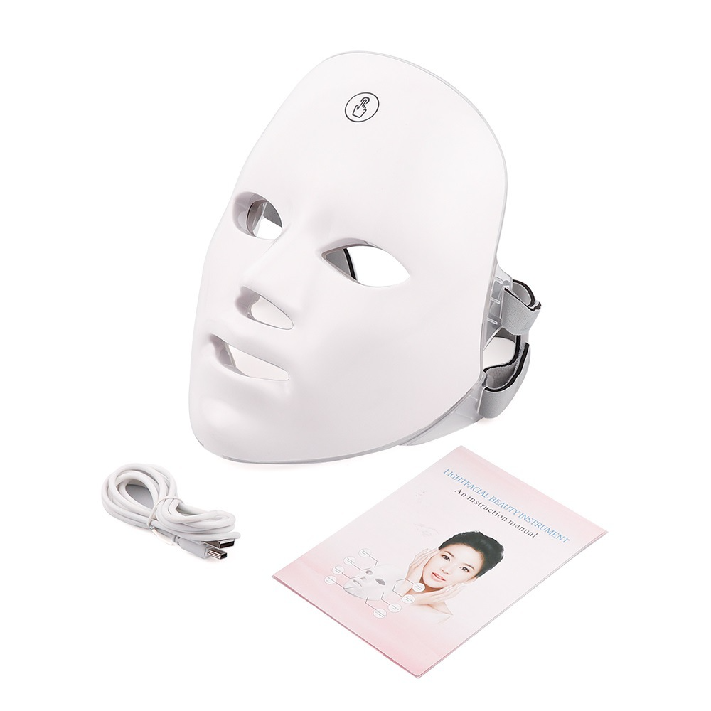 White LED facial beauty mask with charging cable and manual