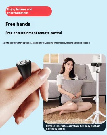 Hand wearing a Bluetooth ring remote for hands-free phone control