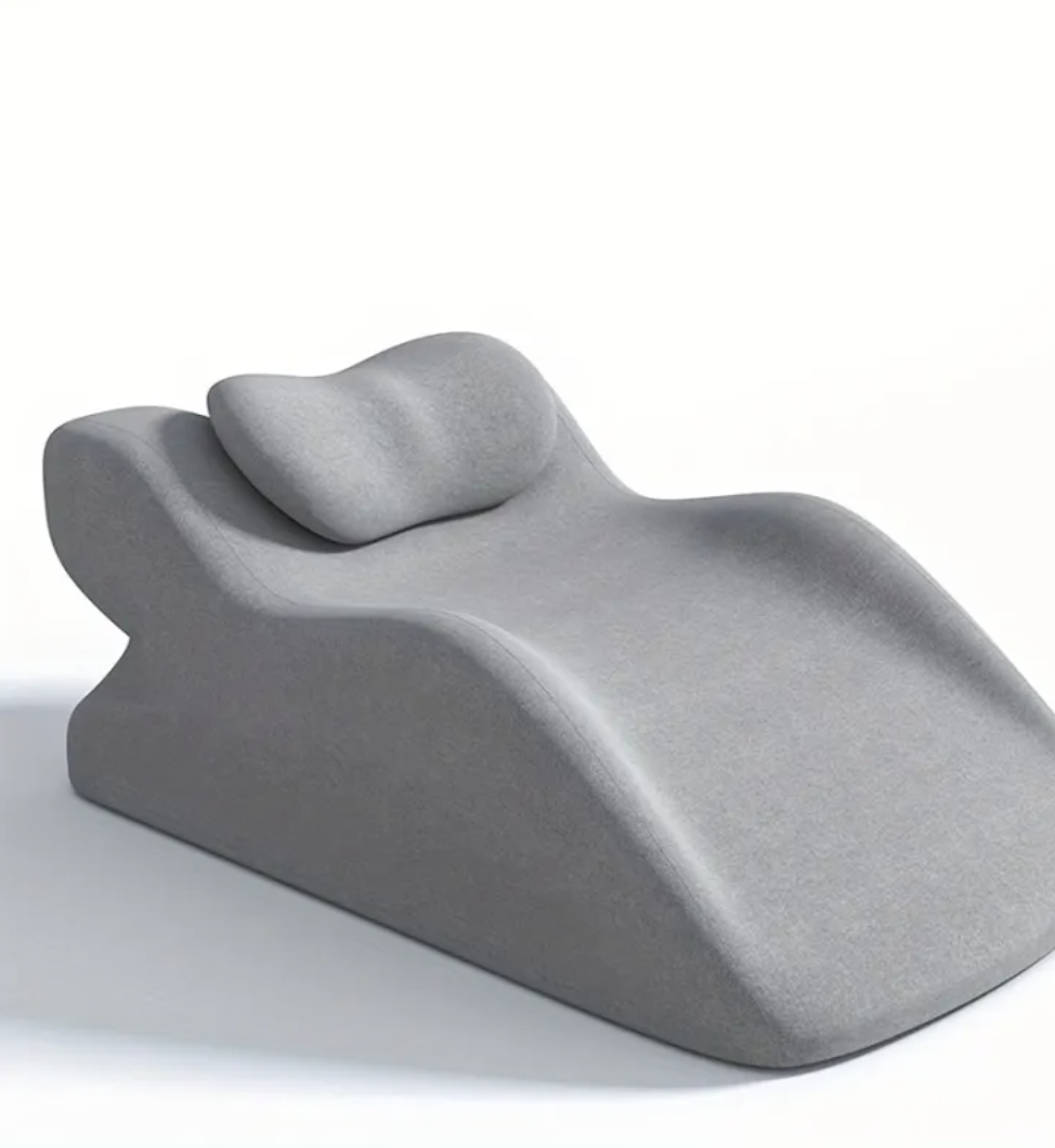 Gray stomach sleeper pillow with contoured face rest, front view