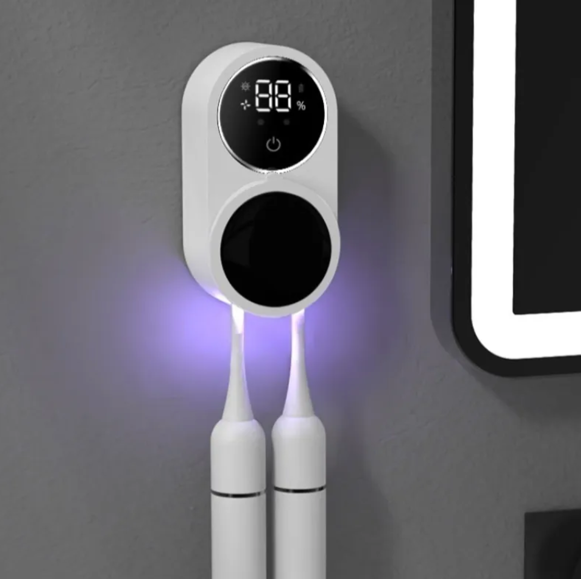 Wall-mounted UV toothbrush sanitizer with digital display holding two brushes