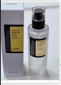 Real photo of snail mucin essence bottle and box