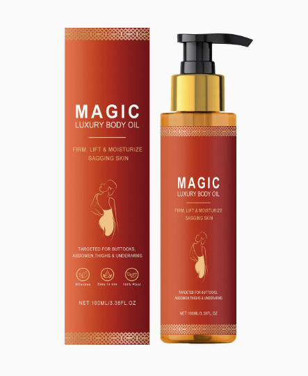 Magic body oil bottle standing next to its red box