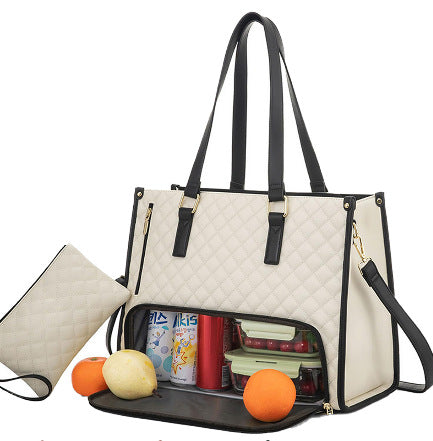Cream with black straps quilted insulated lunch tote with matching pouch and food inside