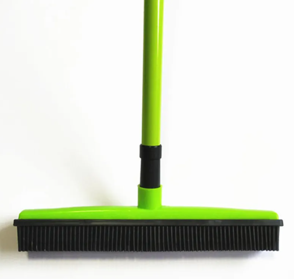 Pet hair removal broom with rubber bristles and green handle