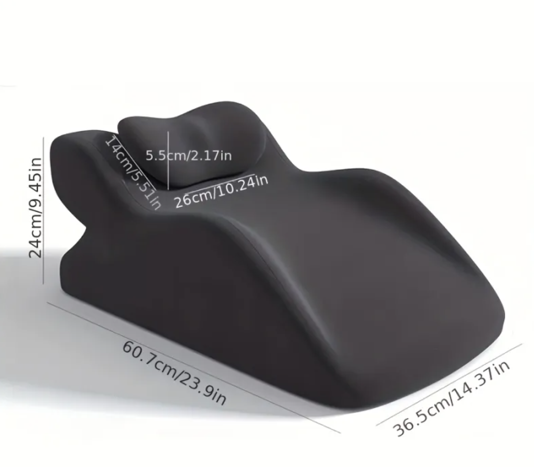 Dark gray stomach sleeper pillow with size measurements