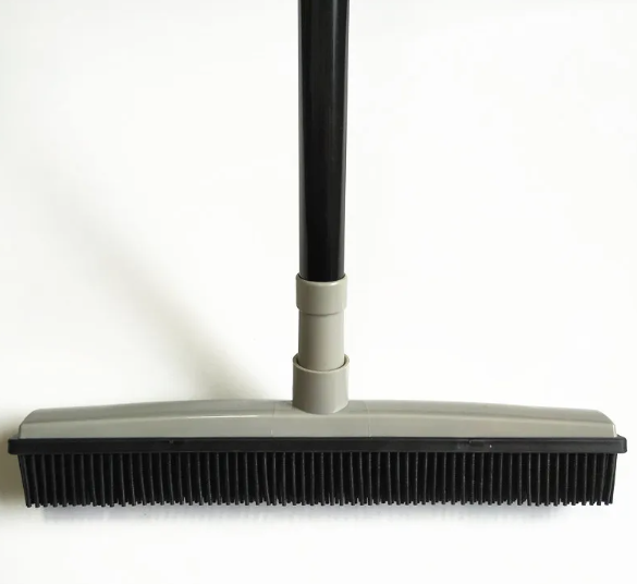 Pet hair removal broom with rubber bristles and gray handle