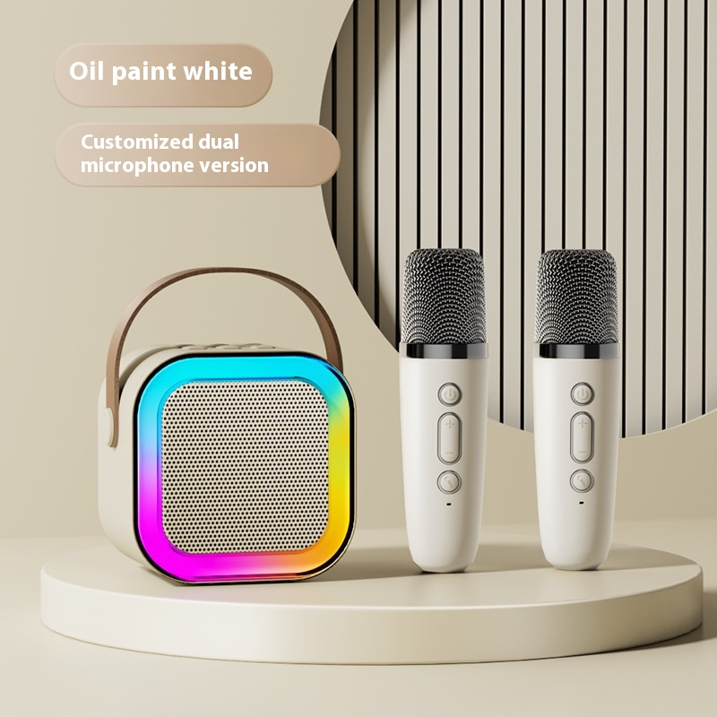 White Bluetooth karaoke speaker with rainbow light ring and two microphones