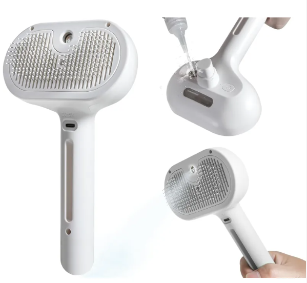 White pet hair spray brush with water tank shown spraying mist