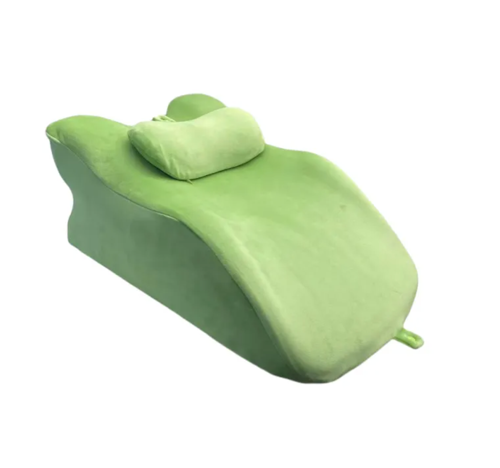 Green stomach sleeper pillow with removable headrest
