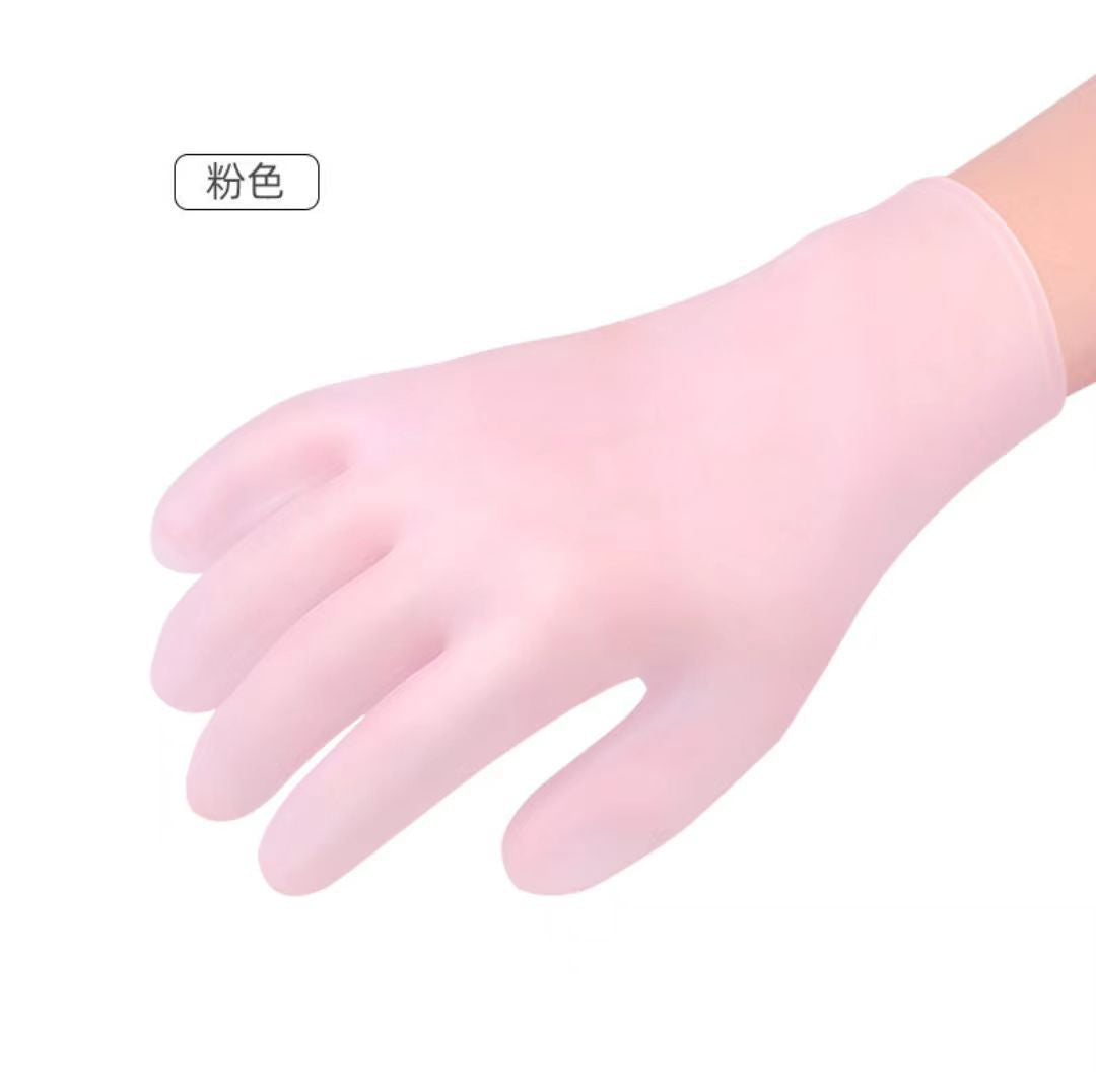 Hand wearing a pink silicone moisturizing glove