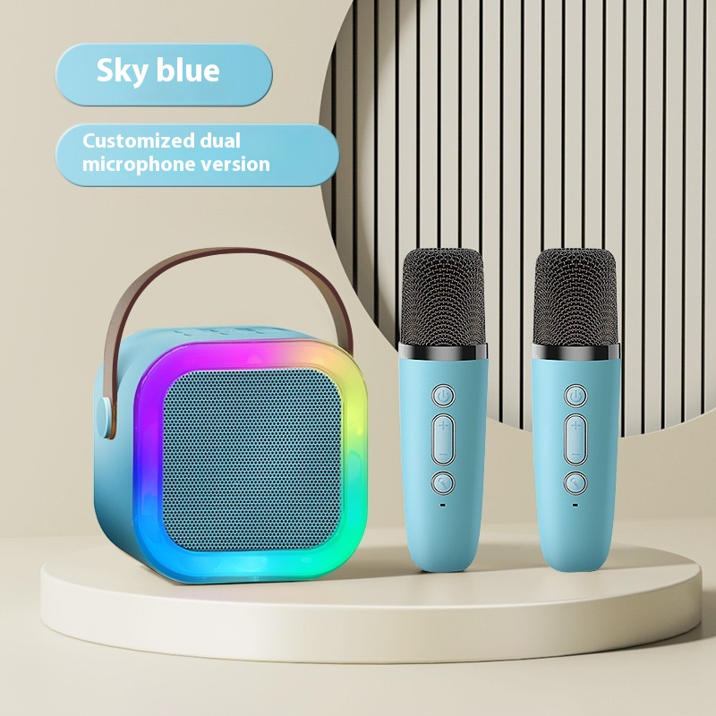 Sky blue Bluetooth karaoke speaker with two wireless microphones shown upright
