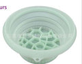 Mint green collapsible silicone ice basin showing its textured base